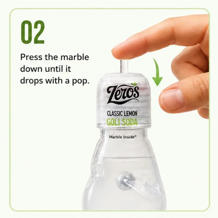 Step two. Press the marble down until it drops with a pop.